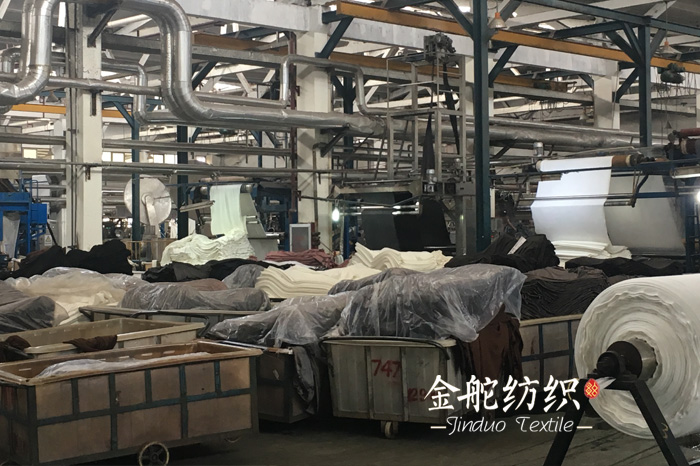 回望2018年紡織面料印染行業(yè)十大關鍵詞-麂皮絨印染廠生產車間